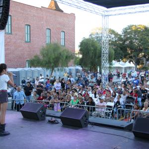 Samantha Elizondo performing in downtown LA at music festival.