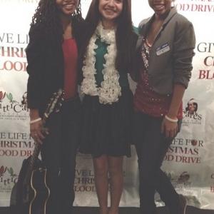 Samantha Elizondo with Chloe  Halle at a Christmas fundraising blood drive a hospital in LA The all performed 2013