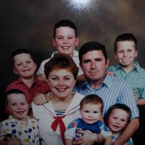 This is a 1987 picture of Joe and his wife and six sons. At the time he was a Special Agent with U.S. Department of Transportation OIG. Joe's wife Lori is center and beginning in the bottom left corner and Jim, Mike, Joe (Vl),Chris, Bill and David.