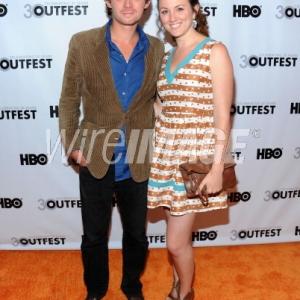 Joey Capone and Laura Holloway arriving at Outfest 2012