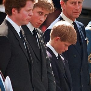 At the funeral for Princess Diana, 1997. This photo was on the cover of People Magazine.