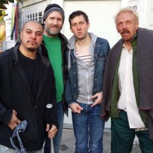 Adam as the homeless man right on location with Duane Andersen Director of Superpowerless in green shirt