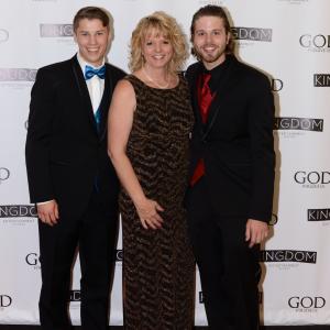 From Left to Right: Kyle Downs [Producer], Regina Bachochin [Executive Producer] and Michael Bachochin [Writer/Director] at the God Forgive Us Red Carpet Premiere in Kenosha, WI.