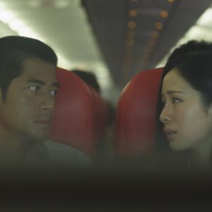 Still of Aaron Kwok and Yi Yan Jiang in Conspirators (2013)