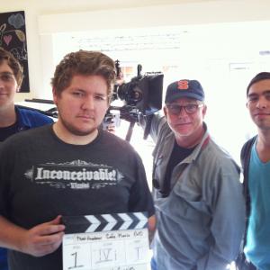 [Left to Right] Jonathon McGee (Writer, Director), Paul Kiszonas (Assistant Director), Taggart Lee (Director of Photography), and Javier Bueno (Camera Operator, Director of Photography) at Petite Reve Cafe during the filming of 
