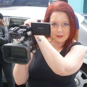 As a Paparazzi on set of 'Brash Young Turks' feature film music video for the theme tune
