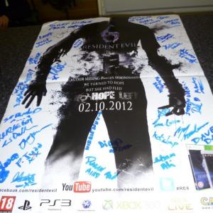 Resident Evil 6 for Capcom, a poster we all signed on set after filming the commercial trailer