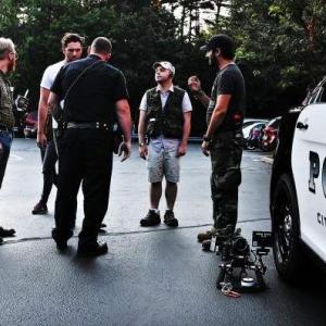 Prepping for shooting in a real Police Cruiser on Cal Robertson's Prism (2014)