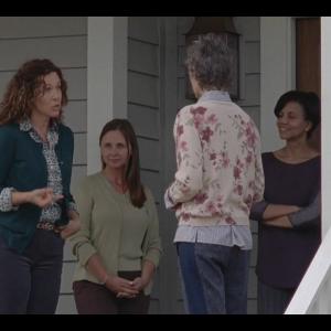 Tiffany Morgan as Erin and Melissa McBride as Carol in The Walking Dead Season 5 Episode 13 Forget