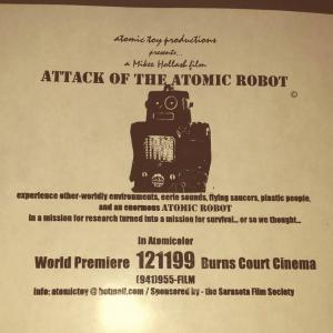 Promotional Lobby Card for Mikee Plastik's film Attack of The Atomic Robot (AOTAR). This was promoting the 12/11/99 World Premiere showing @ Burn's Court Cinema (Sarasota, FL). The screening was done via the Sarasota Film Society.