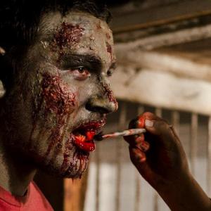 Applying make-up to our principle zombie, Salvatore Sabia from Call of Duty Undead.