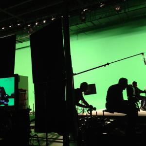 Christian filming Lead on a Psychology Documentary with a green screen