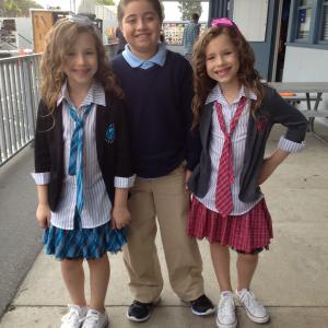 Chirstian and the D'Ambrosio twins on the set of 'Let Your Light Shine.'