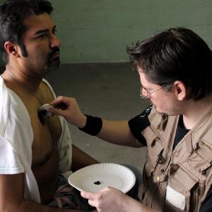 Shawn Lecrone applying special effects make up on Kash Latif on the film, Southwest