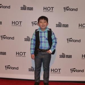 Albert Tsai on the red carpet of Hot In Cleveland Season 5 Premiere (March 26, 2014)