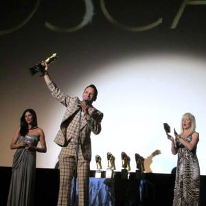 Winning best supporting actor John CampbellMac at The Toscars 2014