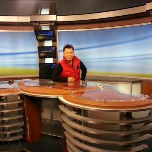 Kenji Saykosy at news station for interview