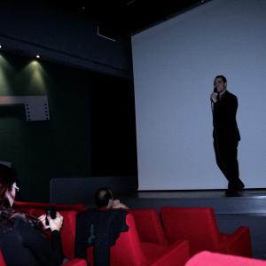 Aziz Tazi giving a speech at the European Premiere of IMAGO