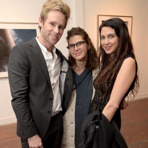 LOS ANGELES, CA - MAY 09: (L-R) Artist Bryan Fox, actresses Marisa Tomei, and Shiva Rose attend We. Alone. a photography exhibit by Bryan Fox at Think Tank Gallery on May 9, 2015 in Los Angeles, California.