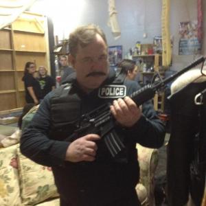 Det. Manatucci on the set for 