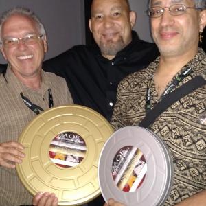 Writer Rob Tobin Festival Director Del Weston and Jax Kearney with his awards at the 2015 Action on Film Festival