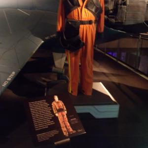 Battlestar Galactica Exhibit Sci Fi Museum Seattle Washington  Illustrated image displayed with a deckhand costume from the series I created costume illustrations for season 2 3 4 as well as DVD Razor It was an honour to see the crews work culmina