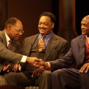 From Seasons of Change The African American Athlete left to right Bobby Mitchell Jesse Jackson Eddie George