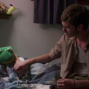 Still of Andrew Garfield and Noah Lomax in 99 Homes 2014