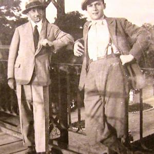 1932. Screenplay Hero ANDRE FRODEL (hat) with Victor Perantoni (beret). Known as a world famous stamp forger, ANDRE was really an honest lithographic artist, not a defrauding counterfeiter. A praised genius expert, lauded by stamp collectors world-wide.