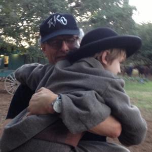 Sawyer Bell gets a hug from DELIVERANCE CREEK director, Jon Amiel.