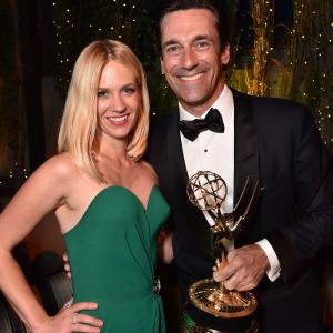 January Jones and Jon Hamm at event of The 67th Primetime Emmy Awards 2015