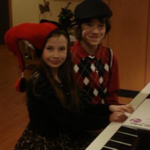 Malia and her brother Christian entertaining the patients on Christmas Day at the Ronald McDonald House