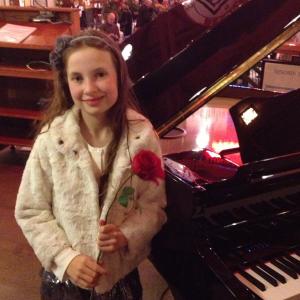 Malia after her piano performance at a City of Calgary event at Heritage Alley, Heritage Park.