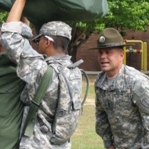 Ft. Benning, Georgia 2008 US Army Drill Sergeant Robert T. Christensen greeting a new Soldier to basic training