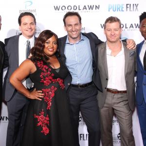 Devon Franklin, producer Kevin Downes, Sherrie Shepherd, Kevin Sizemore, Nic Bishop and Caleb Castille, at the WOODLAWN premiere at the Bruin Theatre. Westwood, CA. Monday October 5th 2015