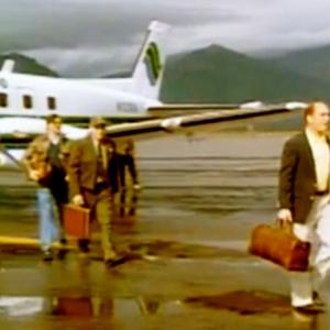 Roys scene from Pursuit of DB Cooper Passenger deplaning upon arrival to Jackson Hole Garton is behind Park Ranger