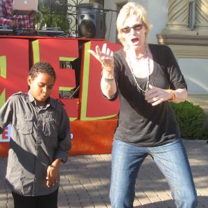Zechariah Dardaine and Jane Lynch of Glee dancing at Fred the movie premiere