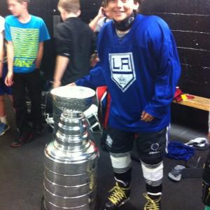 Ashton is a Hockey Player at the Toyota Center  pic with The Stanley Cup!