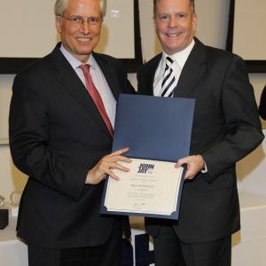 Award for 25 years of administrative service to John Jay College of Criminal Justice, April 18, 2012. President Jeremy Travis and Dr. Paul M. Kelly.