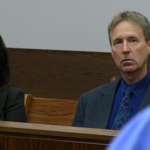 Ashley's parents look on as she appears in court during a scene from Daughter of the King.