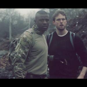 Still of Mo Diaby and Actor Michael Patrick Lane in The Last of Us.