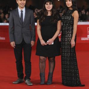 Reza Sixo Safai, Maryam Keshavarz and Sarah Kazemy on the red carpet at the Rome Int'l Film Festival.