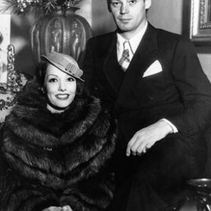 Johnny Weissmuller and Lupe Velez at the Mexican actress' home in Los Angeles, October 8th, just before they made a hurried trip to Las Vegas, Nevada, before dawn, obtained a marriage license and then returned to Los Angeles, denying that they had been married 10-11-1933