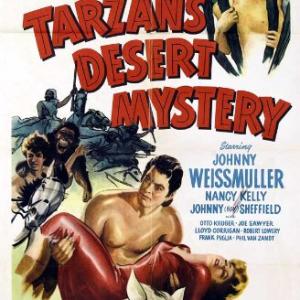 Nancy Kelly Johnny Sheffield and Johnny Weissmuller in Tarzans Desert Mystery 1943