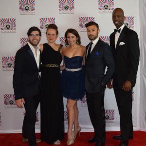 SHIP OF FOOLS team on the red carpet at the 2014 St. Tropez International Film Festival. From Left to Right: Mike McGuirk, Maggie Fine, Natasha Soto-Albors, Rich Dreher, and Rotimi Paul