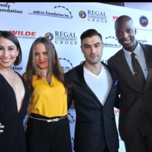 SHIP OF FOOLS creative team and cast on the red carpet at the 2014 Sarasota Film Festival From Left to Right Natasha SotoAlbors Maggie Fine Rich Dreher Rotimi Paul and Mallory Gracenin