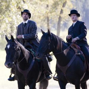 Still of Jeremy Renner and Paul Schneider in The Assassination of Jesse James by the Coward Robert Ford (2007)