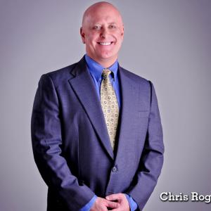 Chris Rogers, commercial headshot, no goatee', suit