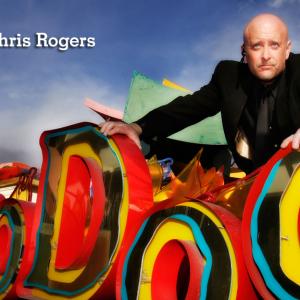 Chris Rogers on top of Voodoo sign at Neon Boneyard.