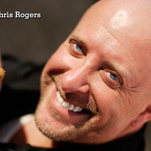 Chris Rogers smiling with cigar